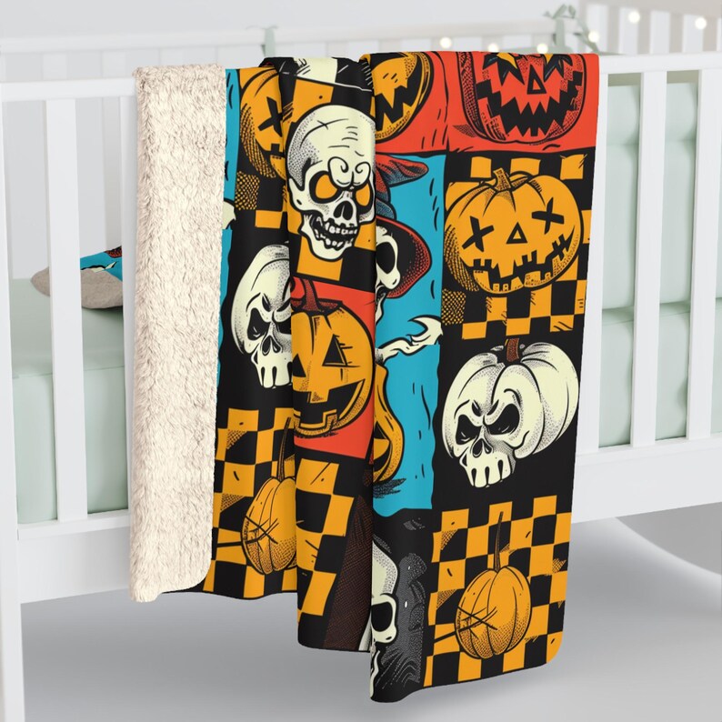 May include: A Halloween-themed throw blanket with a colourful patchwork design featuring skulls, pumpkins, and checkerboard patterns.