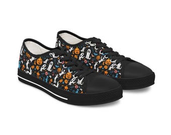 May include: A pair of black canvas low-top sneakers with a Halloween-themed print featuring ghosts, pumpkins, bats, and other spooky elements.