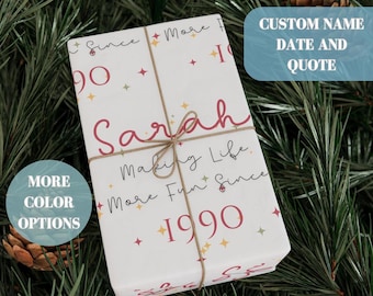 May include: White wrapping paper with a red and gold star pattern. The text "Sarah Making Life More Fun Since 1990" is printed on the paper.  The text "Custom Name Date and Quote" is printed on a blue background.