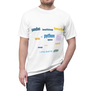 May include: White t-shirt with a blue and yellow graphic design featuring the words "pandas", "beautifulsoup", "tensorflow", "keras", "python", "opencv", "matplotlib", "numpy", and "I FIX DATA".