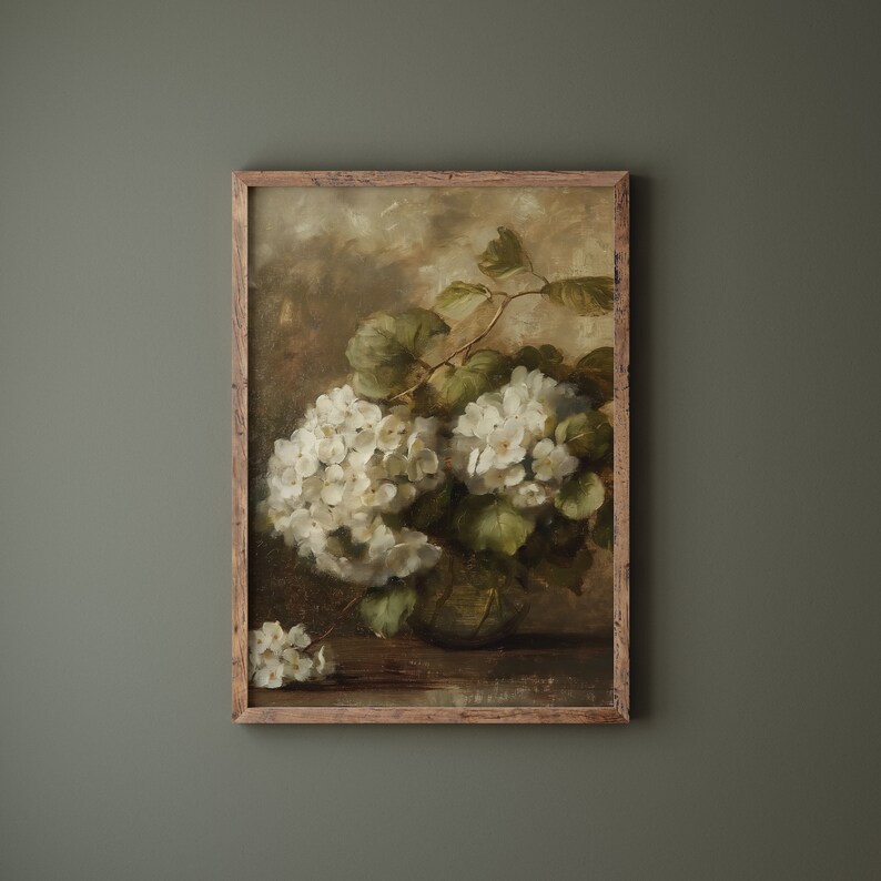 May include: A framed painting depicting a white hydrangea bouquet in a green vase. The flowers are arranged in a cluster with green leaves and stems. The background is a muted brown with a hint of yellow.
