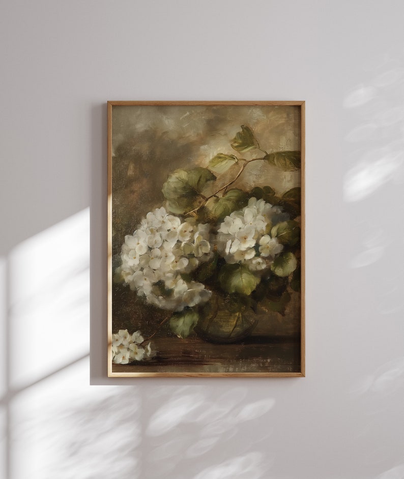 May include: A vintage oil painting depicting a bouquet of white hydrangeas in a clear glass vase. The flowers are arranged in a loose, natural style, and the painting has a soft, romantic feel.