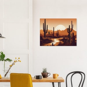 May include: A digital painting of a desert landscape with a sunset sky. The painting features a lake with a reflection of the sun, and several tall cacti in the foreground. The mountains in the background are silhouetted against the orange sky.