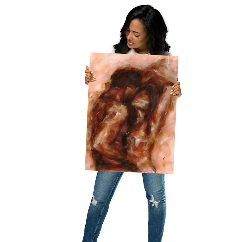 May include: An abstract painting with warm brown and reddish-brown tones. The artwork depicts two figures in an embrace, with visible brushstrokes and a textured appearance. The canvas is held by a person wearing blue jeans.