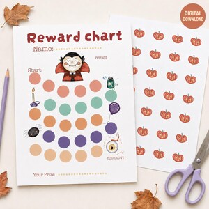 May include: A printable reward chart featuring a vampire illustration, the text Reward chart, Name, Start, reward, and You did it. The chart includes colorful circles, a candle, a spider, a balloon, a potion bottle, and an eyeball. A second sheet shows orange pumpkins.