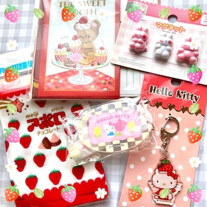 Paquete oficial de productos con temática de Hello Kitty y postres (incluye imanes, juego de letras, llavero, etc.)