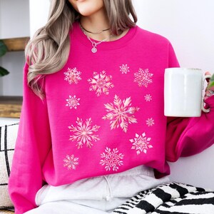 Pink snowflake jumper online