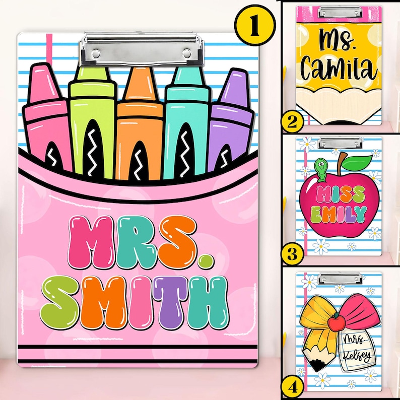 May include: A set of four clipboards with colorful designs. One clipboard features a pink crayon design with the text "MRS. SMITH." Other clipboards have pencil, apple, and bow designs with names. Each clipboard has a silver clip.