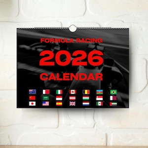 May include: A Formula Racing 2026 calendar with a black and white background image of a race car. The text "FORMULA RACING 2026 CALENDAR" is in red. Below the text are small flags of different countries.