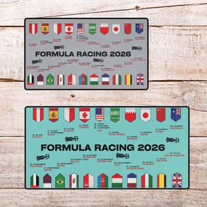 May include: Two rectangular Formula Racing 2026 schedule mats. The top mat is grey, and the bottom mat is teal. Both mats feature flags of different countries and race car illustrations. The text "FORMULA RACING 2026" is displayed on both mats.