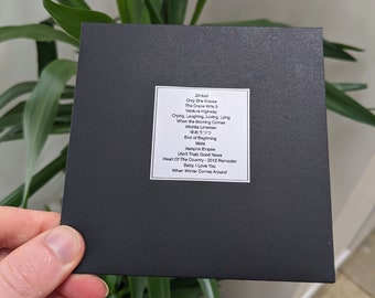 CD personalizado y lista de canciones