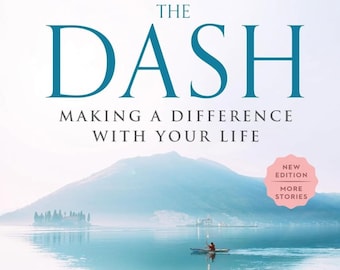 May include: Book cover with a blue title "THE DASH" and the subtitle "MAKING A DIFFERENCE WITH YOUR LIFE". The cover features a misty mountain scene with a small boat on a lake. The book is by Linda Ellis and Mac Anderson.