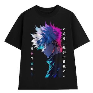 May include: Black t-shirt with a profile illustration of a character with white and blue hair, and a purple and pink gradient. The name "SATORU" is written vertically on the left, and Japanese text is on the right.