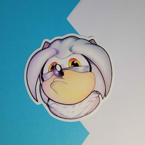 May include: A white and purple cartoon character with yellow eyes and a purple nose. The character has a white and purple fur collar.