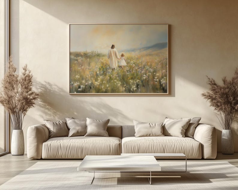 May include: A painting depicting a woman and a young girl walking through a field of wildflowers. The woman is wearing a white dress and the girl is wearing a pink dress. The painting is set against a backdrop of a blue sky and green hills.