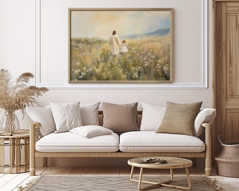 May include: A painting depicting a woman and a young girl walking through a field of wildflowers. The woman is wearing a white dress and the girl is wearing a pink dress. The painting is executed in a soft, muted palette and has a dreamy, ethereal feel.