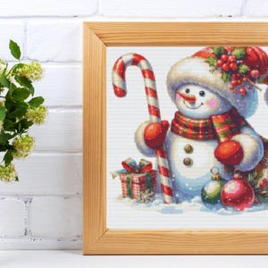 Snowman holding Candy Cane cross stitch pattern