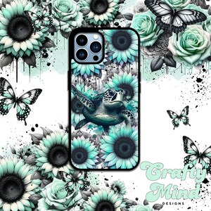 May include: A smartphone case featuring a sea turtle swimming among mint green sunflowers and black and white butterflies. The design includes watercolour-style paint splatters and the text Crafty Mind DESIGNS in the bottom right corner.