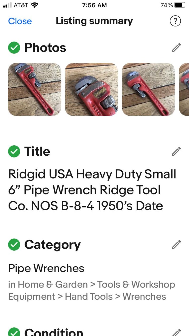 May include: A red Ridgid USA Heavy Duty Small 6" Pipe Wrench Ridge Tool Co. NOS B-8-4 1950's Date. The wrench is on a wooden surface.
