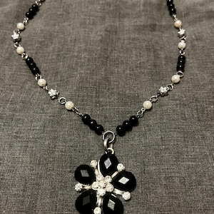 Handmade Black & White Beaded Necklace with Sparkling Flower Pendant