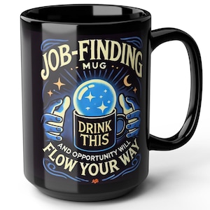 May include: Black ceramic coffee mug with a design of a crystal ball with stars and a crescent moon. The text reads "Job-Finding Mug Drink This And Opportunity Will Flow Your Way".