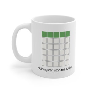 May include: White ceramic mug with a green progress bar graphic and the text "Nothing can stop me today."
