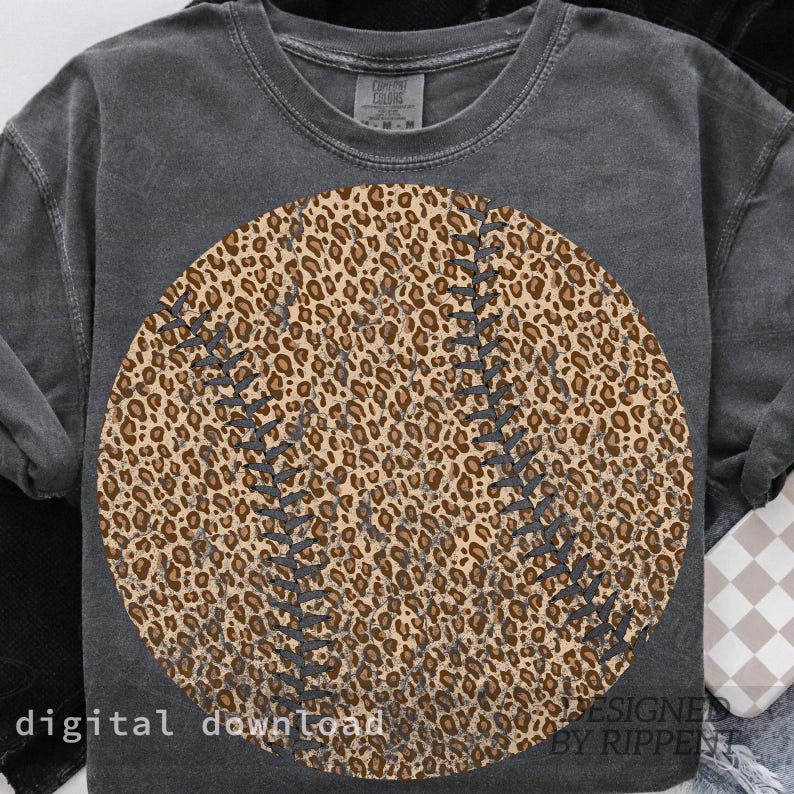 May include: A dark gray sweatshirt featuring a large baseball design with a leopard print pattern. The baseball has dark gray stitching details. The words "digital download" are printed at the bottom left, and "DESIGNED BY RIPPENT" is printed at the bottom right.