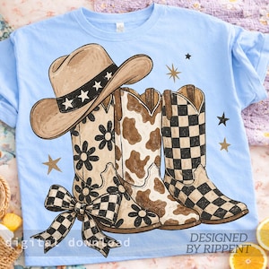 May include: Light blue t-shirt featuring a cowboy hat and three pairs of cowboy boots. The boots have floral, cowhide, and checkered patterns. A checkered bow is at the bottom. Gold and black stars are scattered around the design. Text reads "digital download" and "DESIGNED BY RIPPENT."