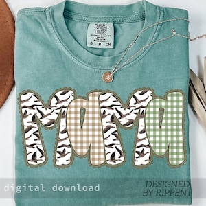 May include: A teal Comfort Colors t-shirt with the word "MAMA" in a decorative font. The letters feature a combination of bird patterns and gingham prints. A gold necklace rests on the shirt. The words "digital download" and "designed by Rippent" are also visible.