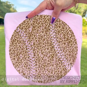 May include: A pink baseball-themed design featuring a leopard print pattern. The baseball design has pink stitching and is set against a pink background. The text "digital download" and "DESIGNED BY RIPPENT" are visible.