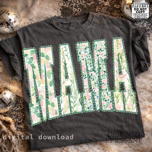 May include: Dark gray t-shirt with the word "MAMA" in large, floral-filled letters. The letters are outlined in green with a scalloped edge. The shirt also has the text "digital download" and "DESIGNED BY RIPPENT".