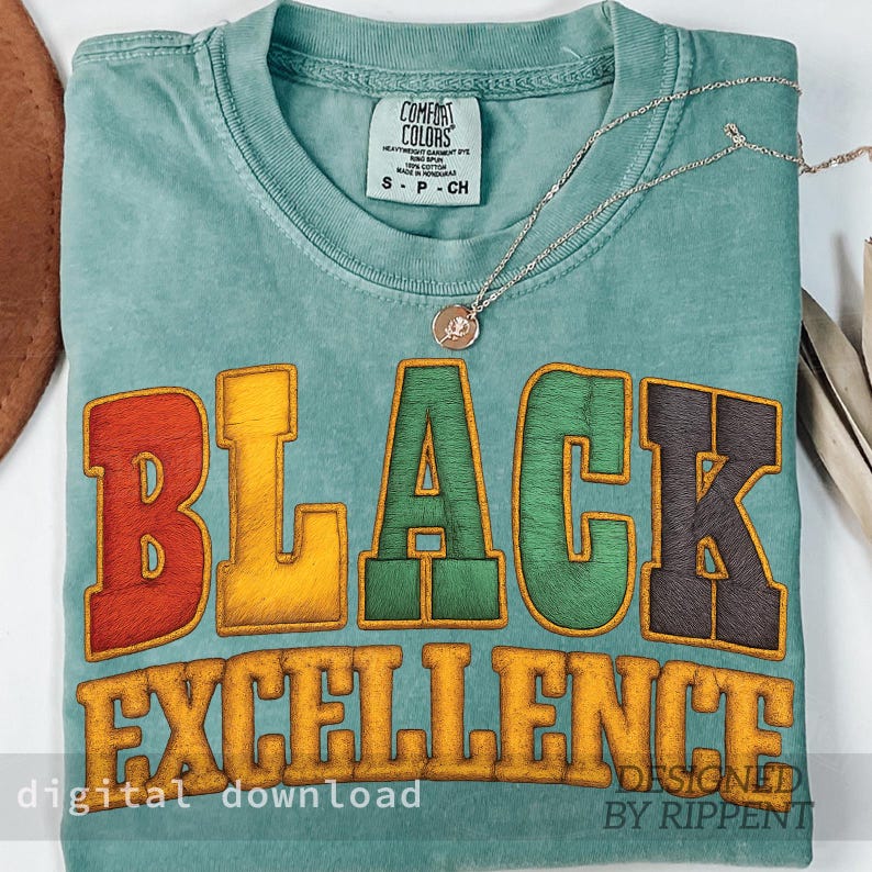 May include: A teal Comfort Colors t-shirt with the words "BLACK EXCELLENCE" in a colorful, embroidered design. The shirt has a small tag and is paired with a silver necklace with a pendant. The words "digital download" and "designed by Rippent" are also visible.