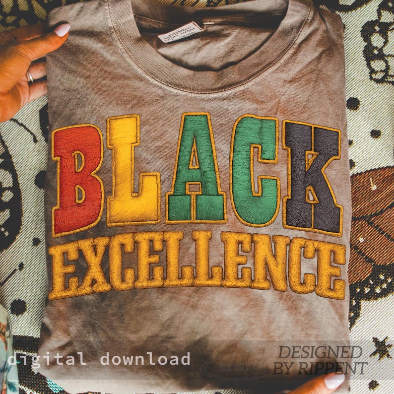 May include: A folded brown t-shirt with the words "BLACK EXCELLENCE" in colorful, embroidered lettering. The text is in red, yellow, green, and black. The words "digital download" and "designed by Rippent" are also visible.