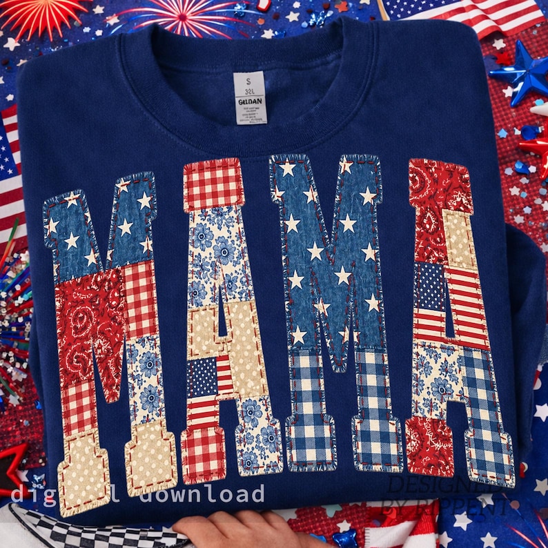 May include: A navy blue sweatshirt with the word "MAMA" appliqued across the front. The letters are patchwork, featuring patterns like stars, floral prints, and the American flag. The sweatshirt is surrounded by patriotic decorations.