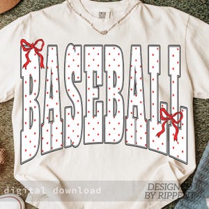 May include: Cream-colored t-shirt with the word "BASEBALL" in large, white, polka-dotted letters. Red bows are on the top left and bottom right. The words "digital download" and "DESIGN BY RIPPE" are at the bottom.