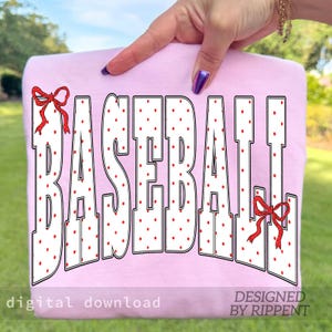 May include: A light pink sweatshirt with the word "BASEBALL" in large white letters with red polka dots. Red bows accent the top and bottom of the word. The words "digital download" and "DESIGNED BY RIPPENT" are at the bottom.