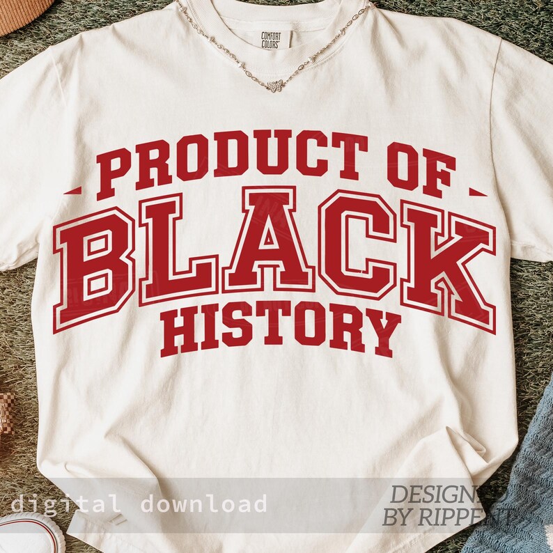 May include: Cream-colored t-shirt with the text "PRODUCT OF BLACK HISTORY" in bold, red, collegiate-style lettering. The shirt has a V-neck and a delicate silver necklace. The words "digital download" and "DESIGN BY RIPPE" are also visible.