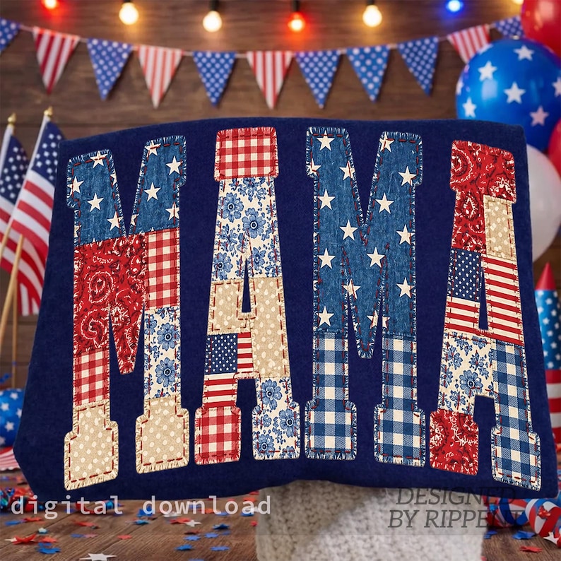 May include: A navy blue decorative pillow with the word "MAMA" appliqued in patriotic patterns. The letters feature red, white, and blue fabrics with stars, stripes, and floral designs. The pillow is decorated with American flags and festive decorations.