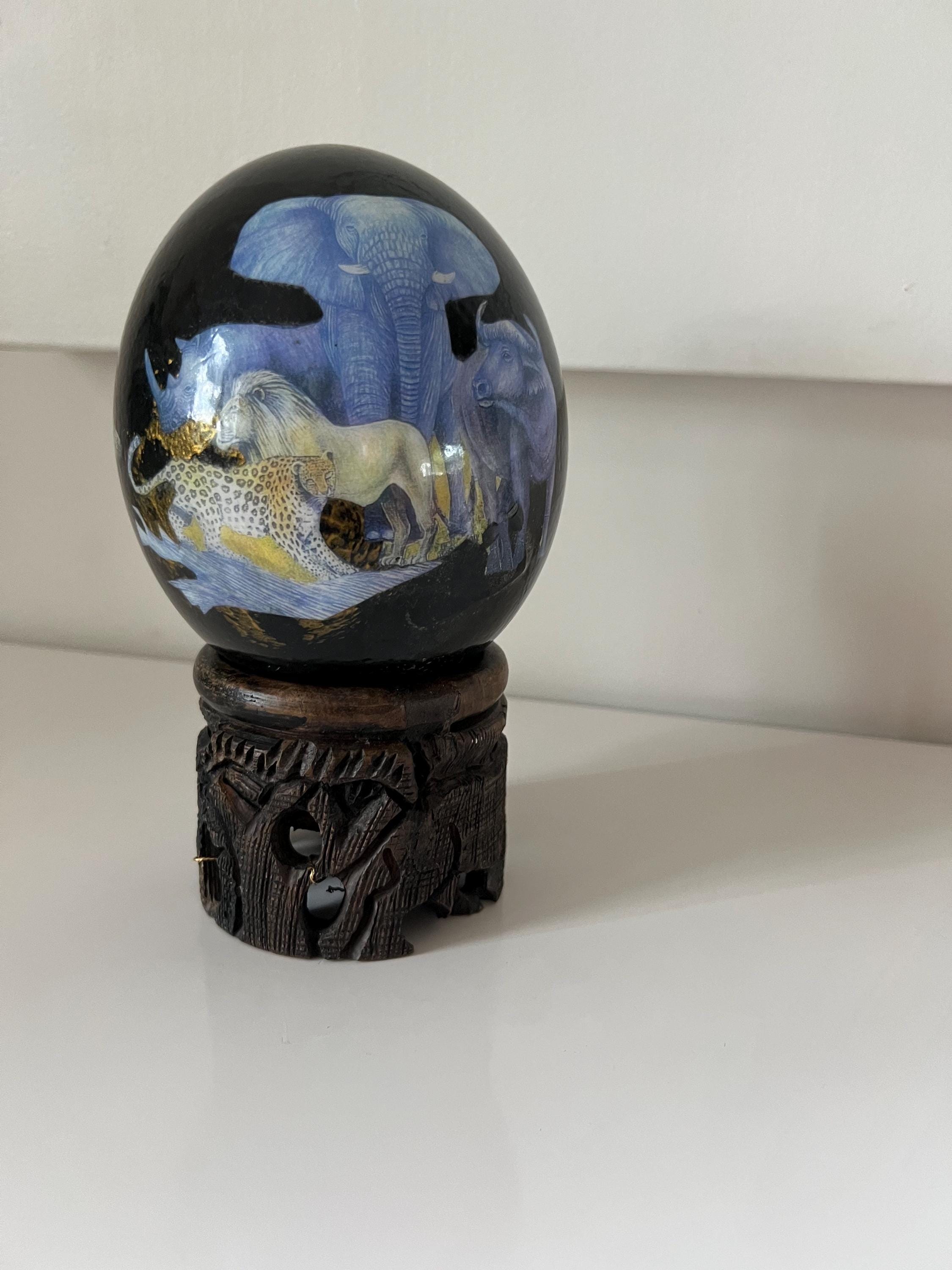 1980s Sherry Rowe Handmade Ostrich Egg Featuring African Wildlife Under Dark Blue Sky