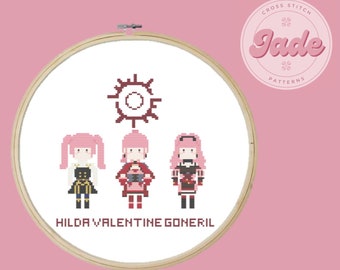 Puede incluir: Patrón de punto de cruz con tres personajes femeninos con cabello rosa y atuendos diferentes, un símbolo solar y el texto "HILDA VALENTINE GONERIL". El patrón está en un aro de bordado blanco.