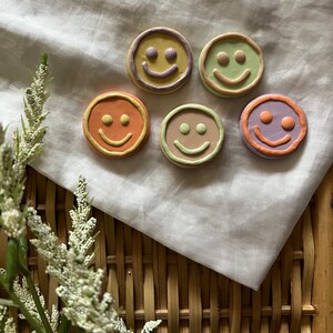 Smiley face magnet set