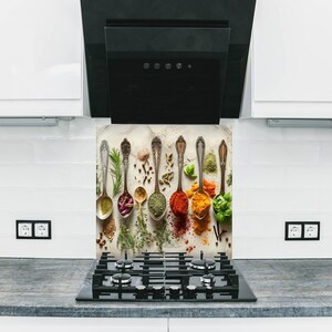 a stove top oven sitting inside of a kitchen