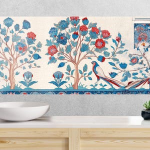 May include: A decorative wall art piece featuring a botanical design with blue and red flowers, trees, and birds. The artwork has a cream-colored background with a blue border. The image is a mosaic style and is suitable for a bathroom.