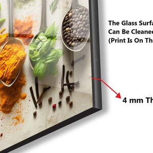 a picture of spices and spoons on a wall