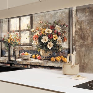 May include: A kitchen splashback with a floral still life painting depicting a window scene. The artwork shows a vase of white, red, and yellow flowers, and fruit. A black tap and sink are in the foreground.