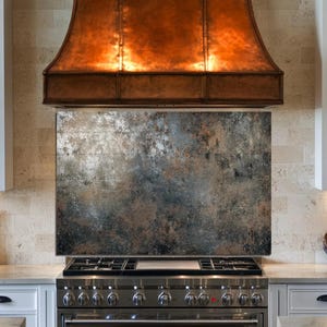 May include: A set of three ceramic mugs with a speckled, matte finish. The mugs are in shades of cream, light gray, and dark gray. Each mug has a simple, minimalist design, perfect for coffee or tea.