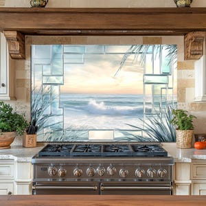 May include: A kitchen with a stainless steel gas range and a decorative backsplash featuring a beach scene. The backsplash is framed by a light-coloured stone and wood trim. Plants and pumpkins decorate the countertop.