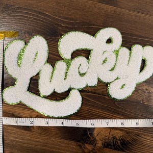 XL Lucky Chenille Patch – St. Patrick’s Day Iron On Patch, Large Lucky Word Patch for Jackets, Sweatshirts, Bags Preorder