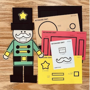 May include: A printable craft template for making a nutcracker. The template includes pieces for the head, body, arms, legs, hat, star, teeth, mustache, shirt, and buckle. The instructions are written in black text on a white background.