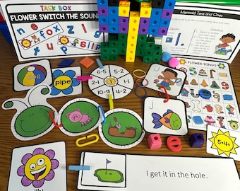 Puede incluir: Una colección de juegos y actividades educativas para niños, que incluye un juego de bingo de flores, un juego de decenas y unidades de sirena, un juego de cambio de sonido de flores y un conjunto de bloques coloridos. Los juegos presentan colores brillantes e ilustraciones divertidas.